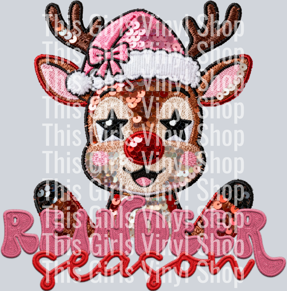 Image of a sequin reindeer with star sequin eyes wearing a pink sequin Santa hat. Underneath reads Reindeer season. great for a Christmas T-shirt